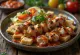 Yoğurtlu Kebab met gegrilde vleesspiezen, tomatensaus en yoghurt