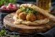 Falafel pita met knapperige kikkererwtenballetjes en tahini