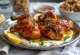 Tandoori kip geserveerd met salade en naanbrood
